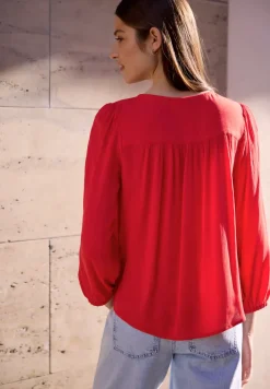3/4 mouw blouse met ronde hals en knopen