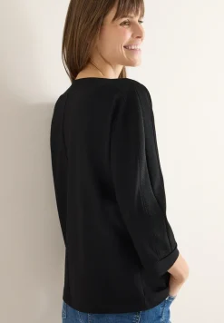 Batwing shirt met tape