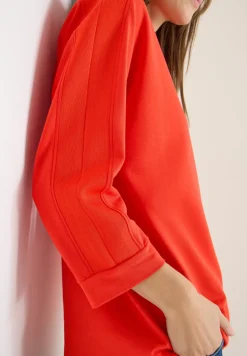 Batwing shirt met tape