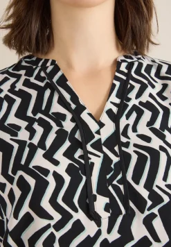Bedrukte blouse met tape