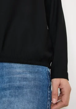 Blouse in effen kleur