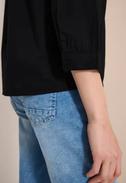 Blouse met 3/4 mouwen en gespleten hals in effen kleur
