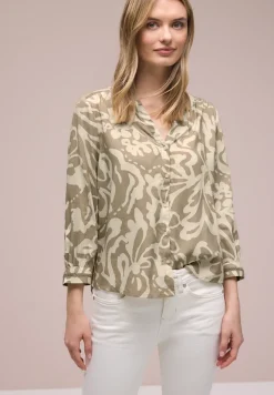 Blouse met 3/4 mouwen en getapete details