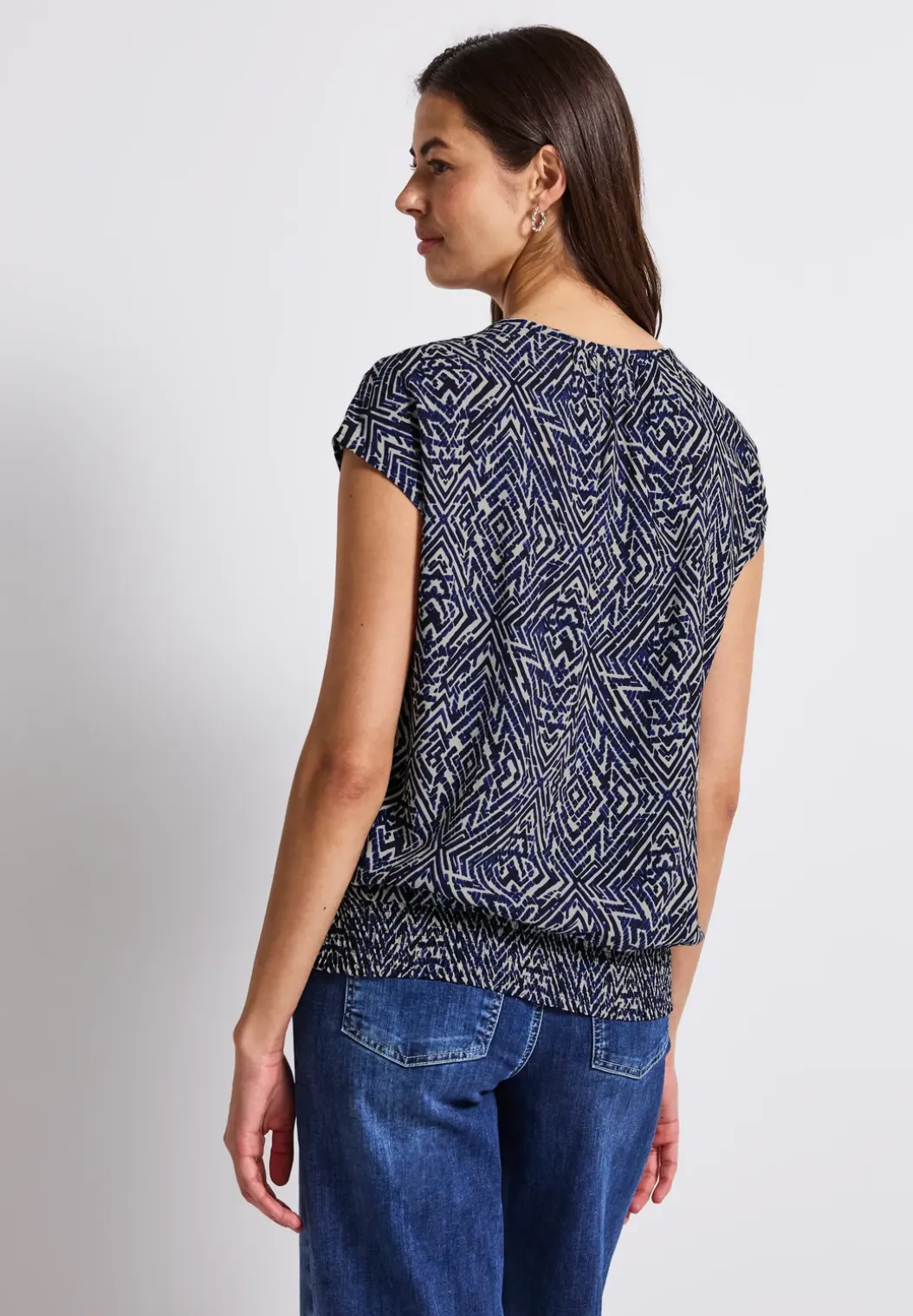 Blouse met gesmokte zoom