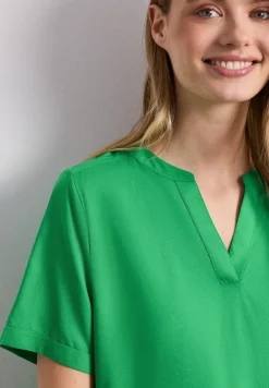 Blouse met gespleten hals en omslag