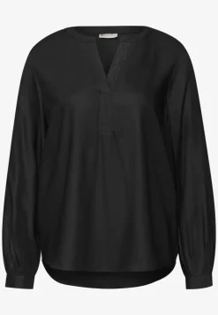 Blouse met glitterdetail