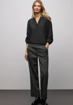 Blouse met glitterdetail