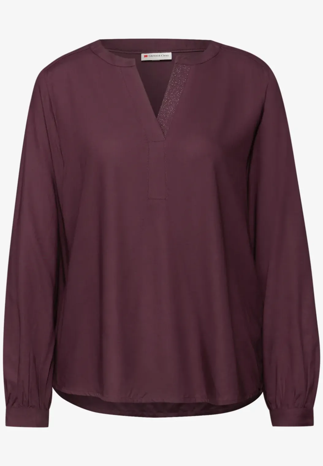 Blouse met glitterdetail