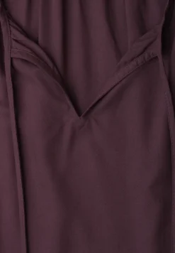 Blouse met hangende schouder en linten