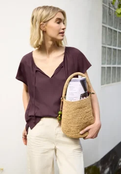 Blouse met hangende schouder en linten