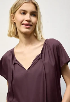 Blouse met hangende schouder en linten