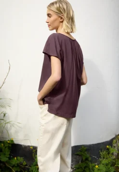 Blouse met hangende schouder en linten