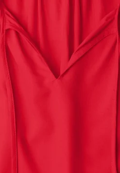 Blouse met hangende schouder en linten