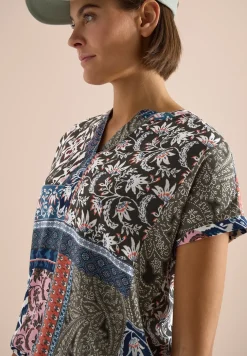 Blouse met korte mouwen en patchworkprint