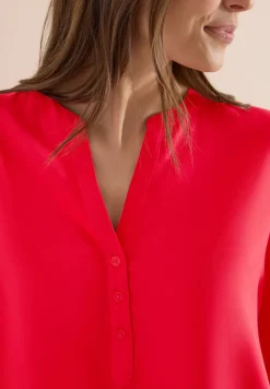Blouse met korte mouwen en gespleten hals