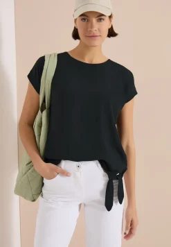 Blouse met ronde hals en knoopdetail