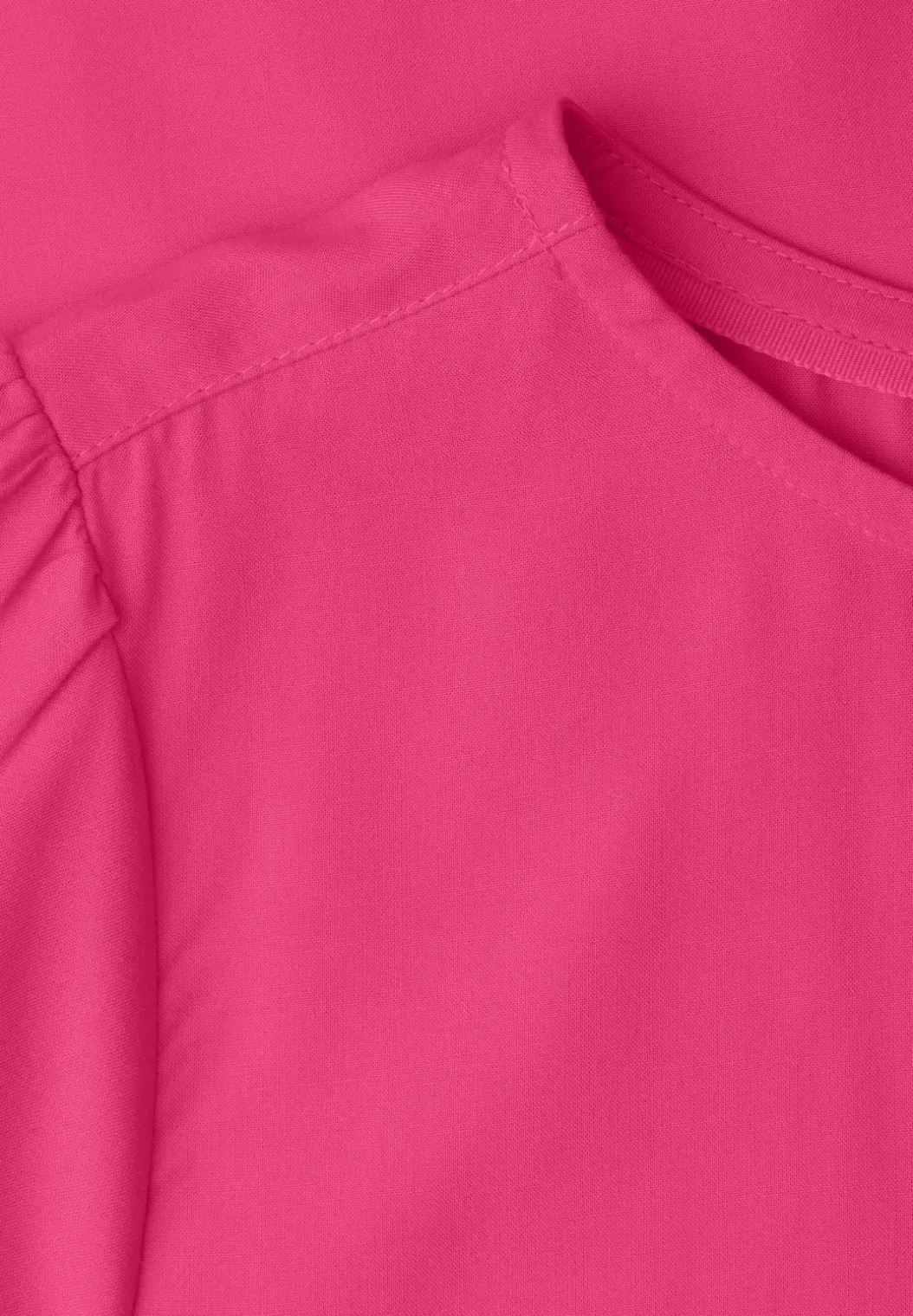 Blouse met ronde hals en korte pofmouwen