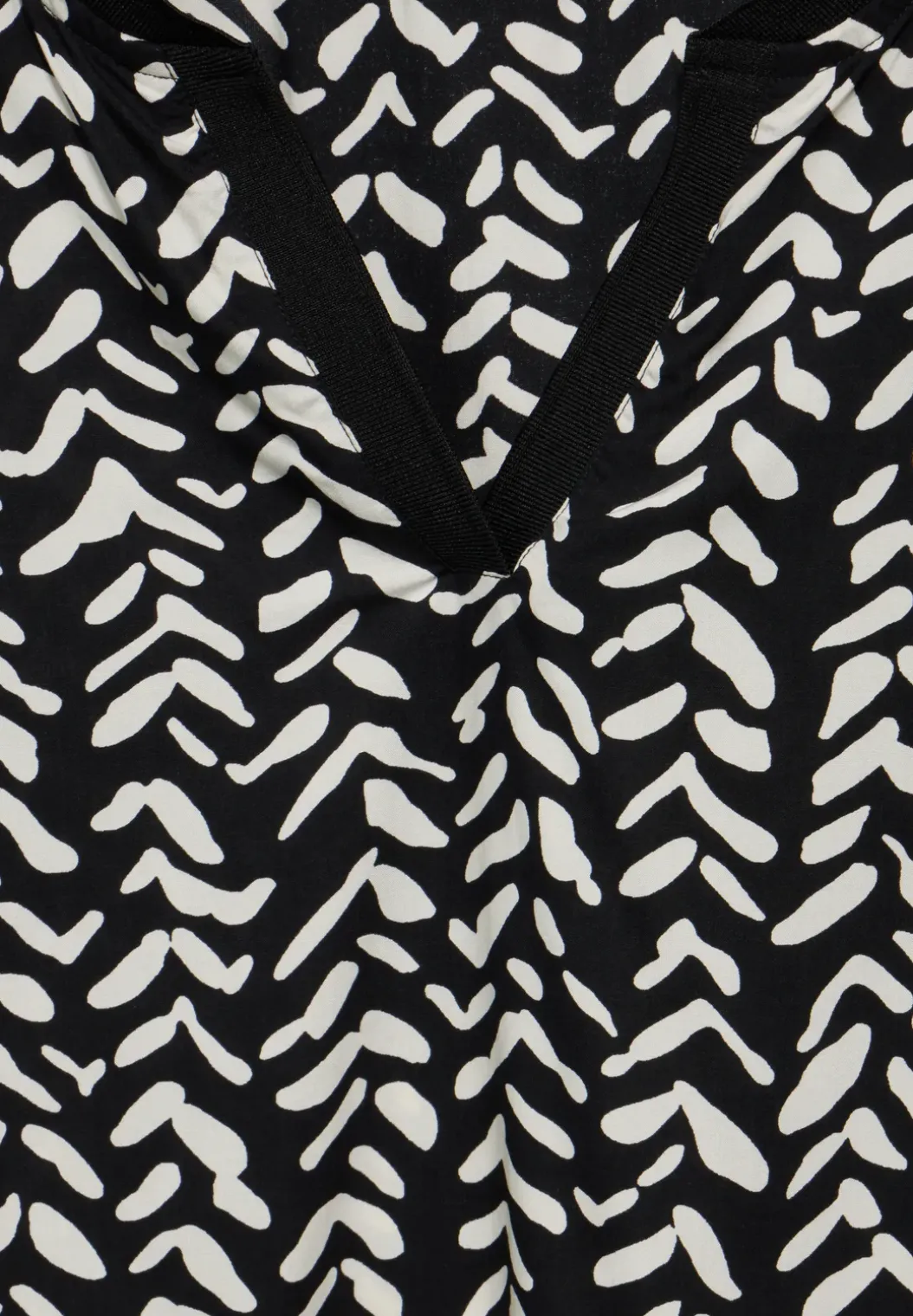Blouse met tape details