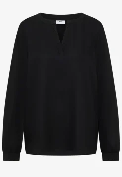 Blouse met glitterdetails
