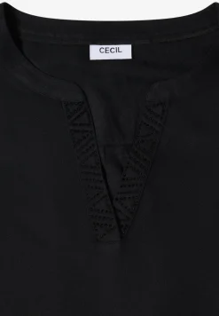 Blouse met glitterdetails
