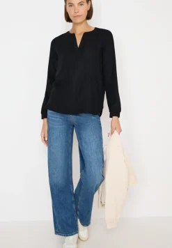 Blouse met glitterdetails