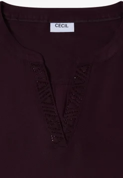 Blouse met glitterdetails