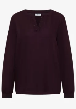 Blouse met glitterdetails