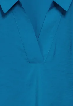 Blouse met tricot mouwen