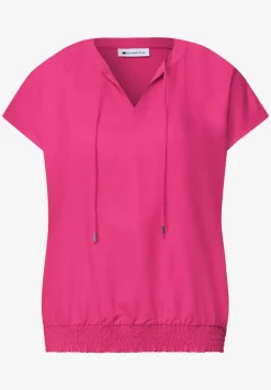Blouseshirt met gespleten hals en smokdetail
