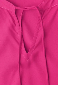 Blouseshirt met gespleten hals en smokdetail