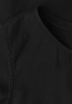 Blousetop met banddetail aan de zoom