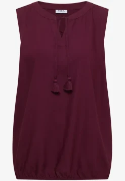Blousetop met gespleten hals en linten
