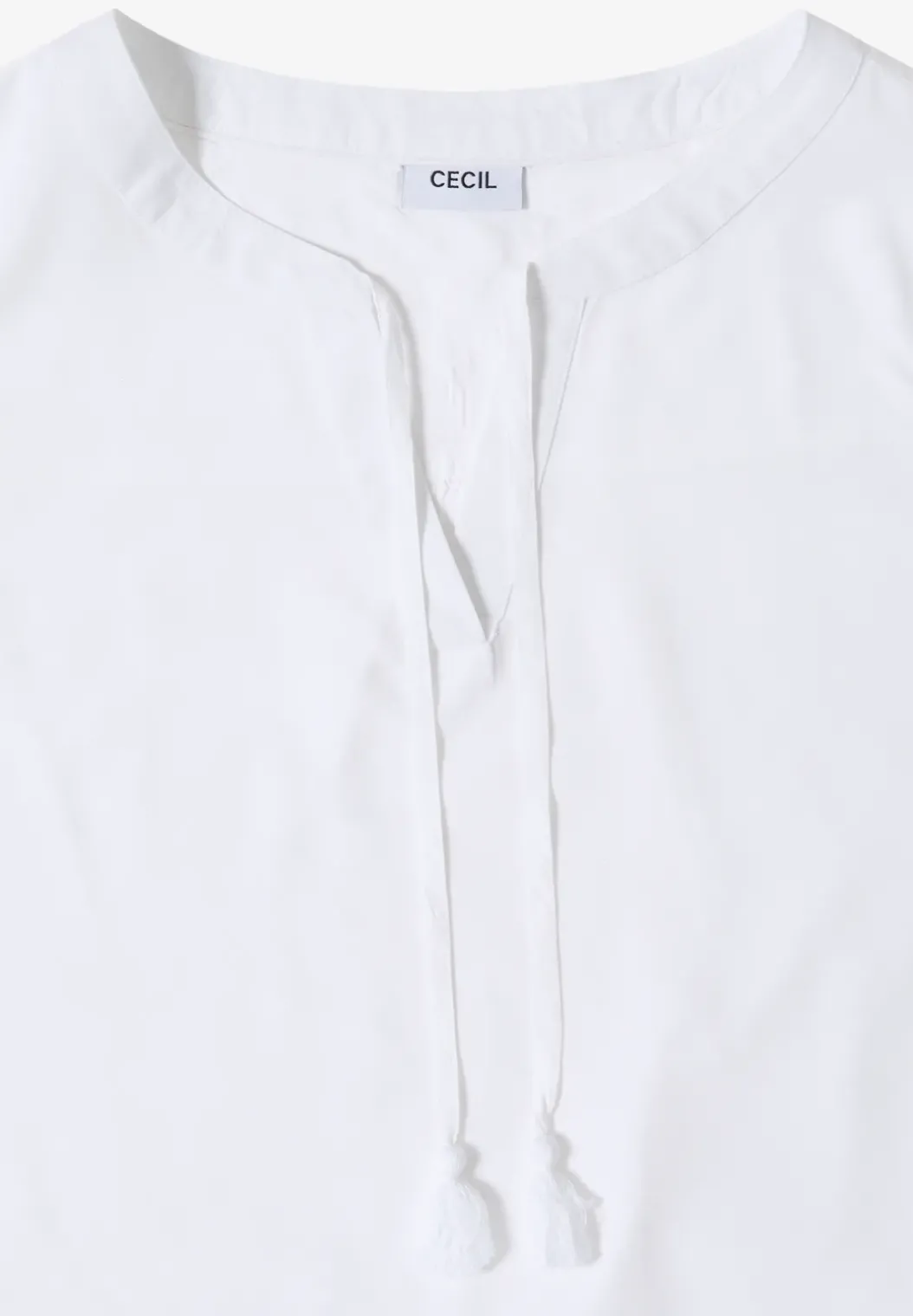 Blousetop met gespleten hals en linten