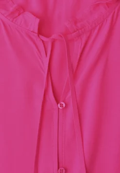 Blousetop met gespleten hals en ruches
