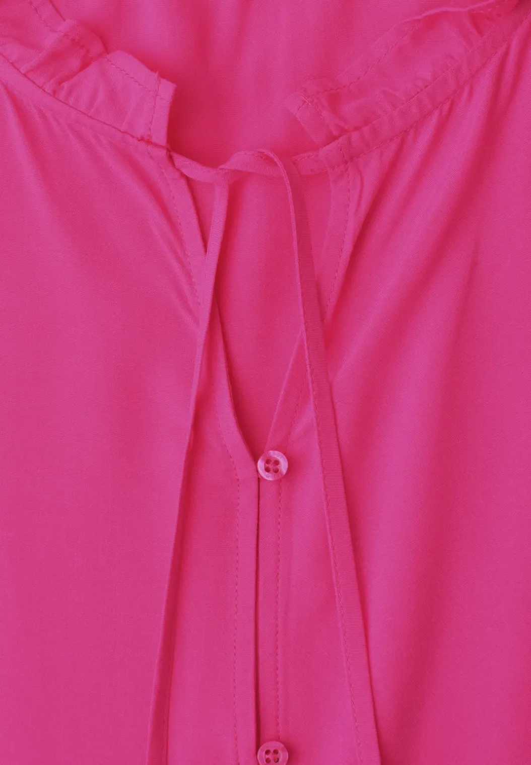 Blousetop met gespleten hals en ruches
