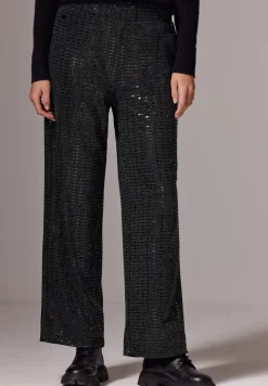 Broek met wijde pijpen en pailletten