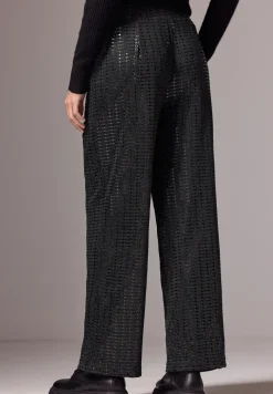 Broek met wijde pijpen en pailletten