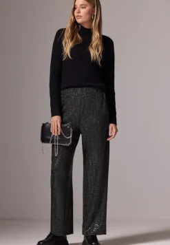 Broek met wijde pijpen en pailletten