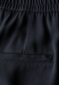 Broek met wijde pijpen in keperstof