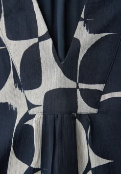 Gedessineerde blouse met tape