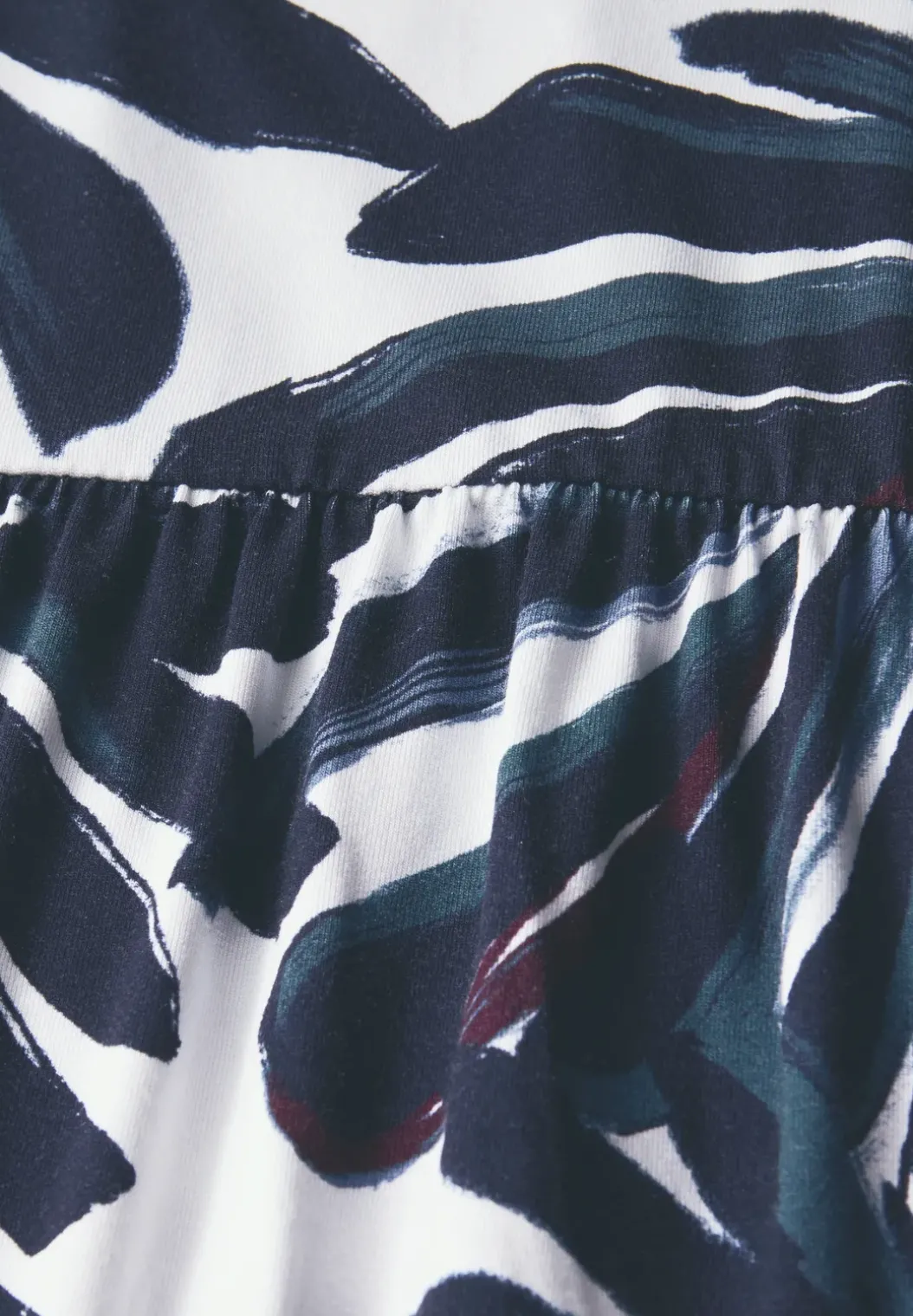 Gedessineerde jersey jurk