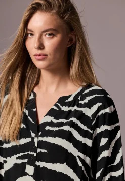 Gedessineerde raglan blouse