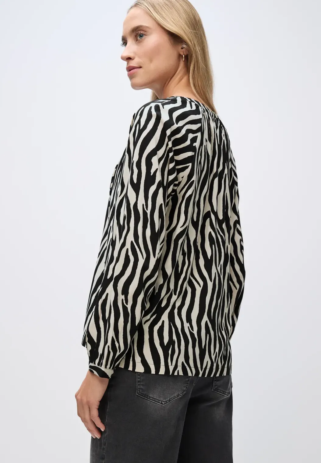 Gedessineerde raglan tuniek