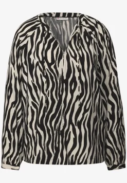 Gedessineerde raglan tuniek