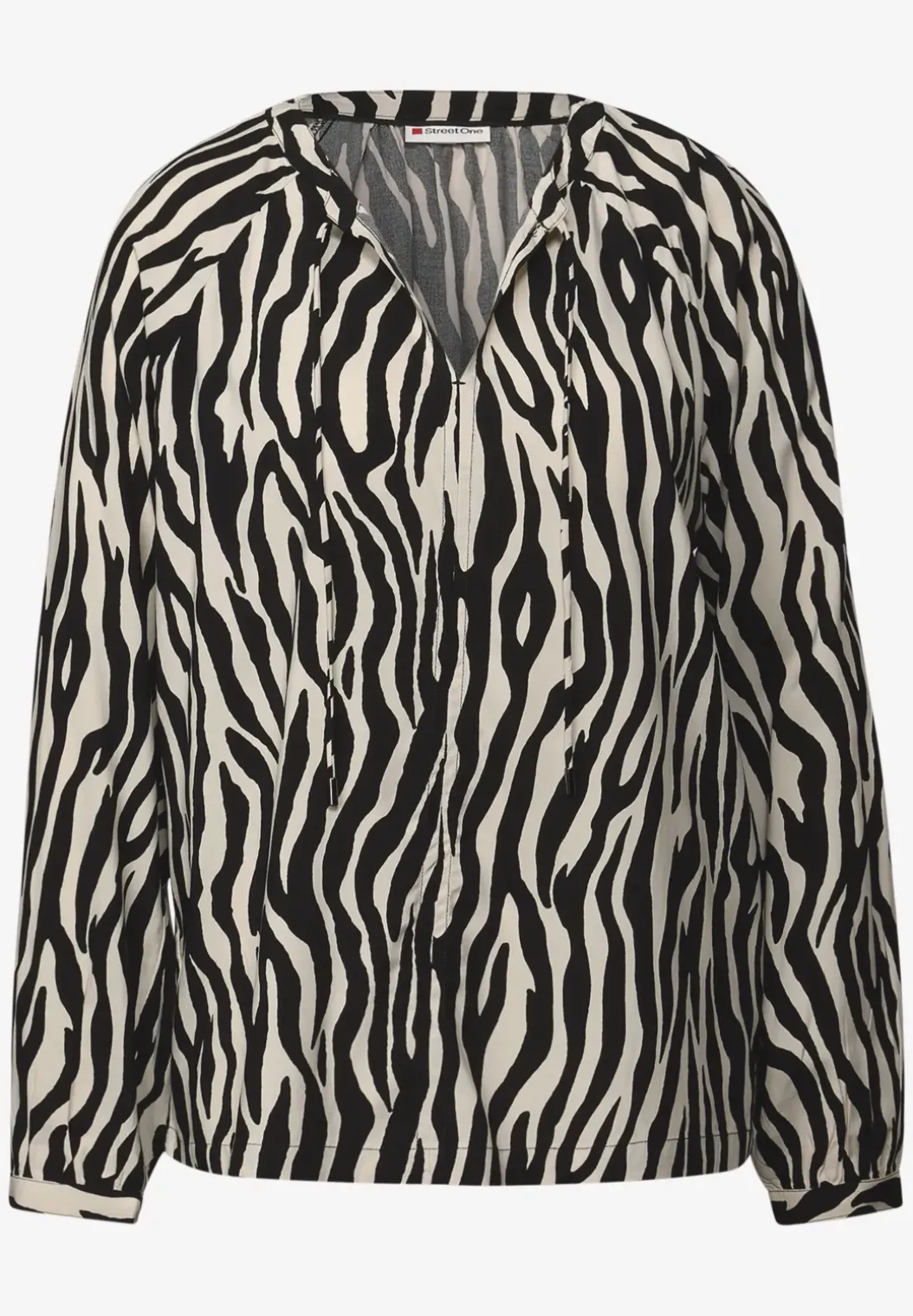 Gedessineerde raglan tuniek