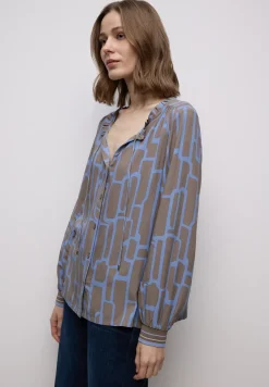 Gedessineerde tuniek met tape