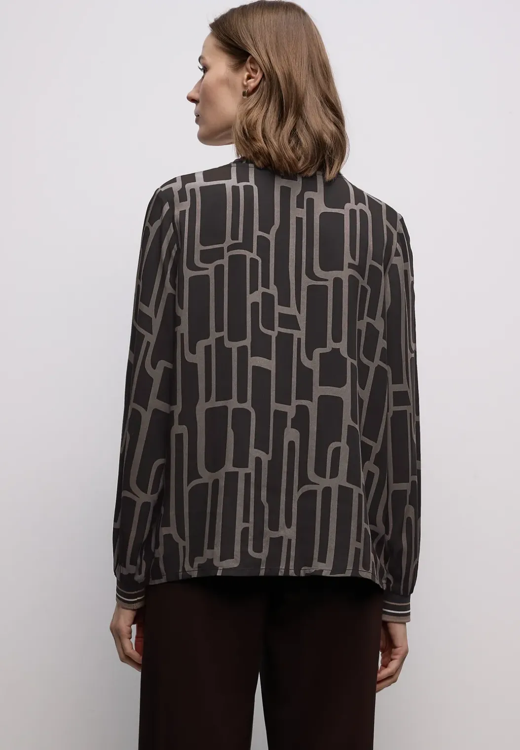 Gedessineerde tuniek met tape