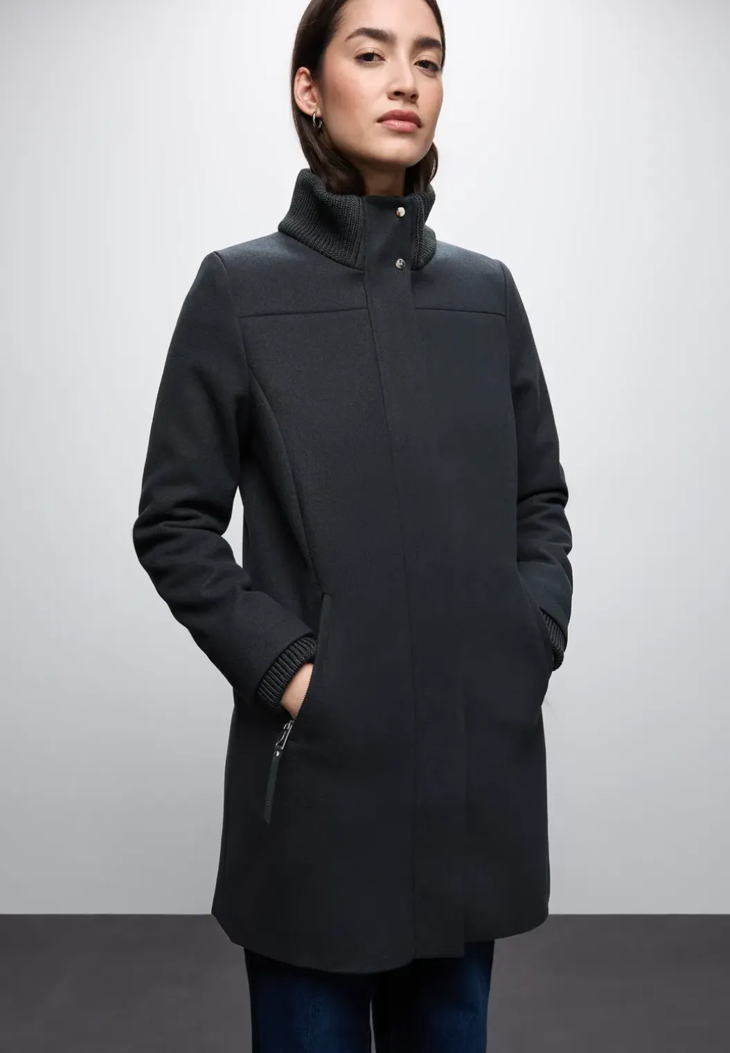 Jas met gebreide details
