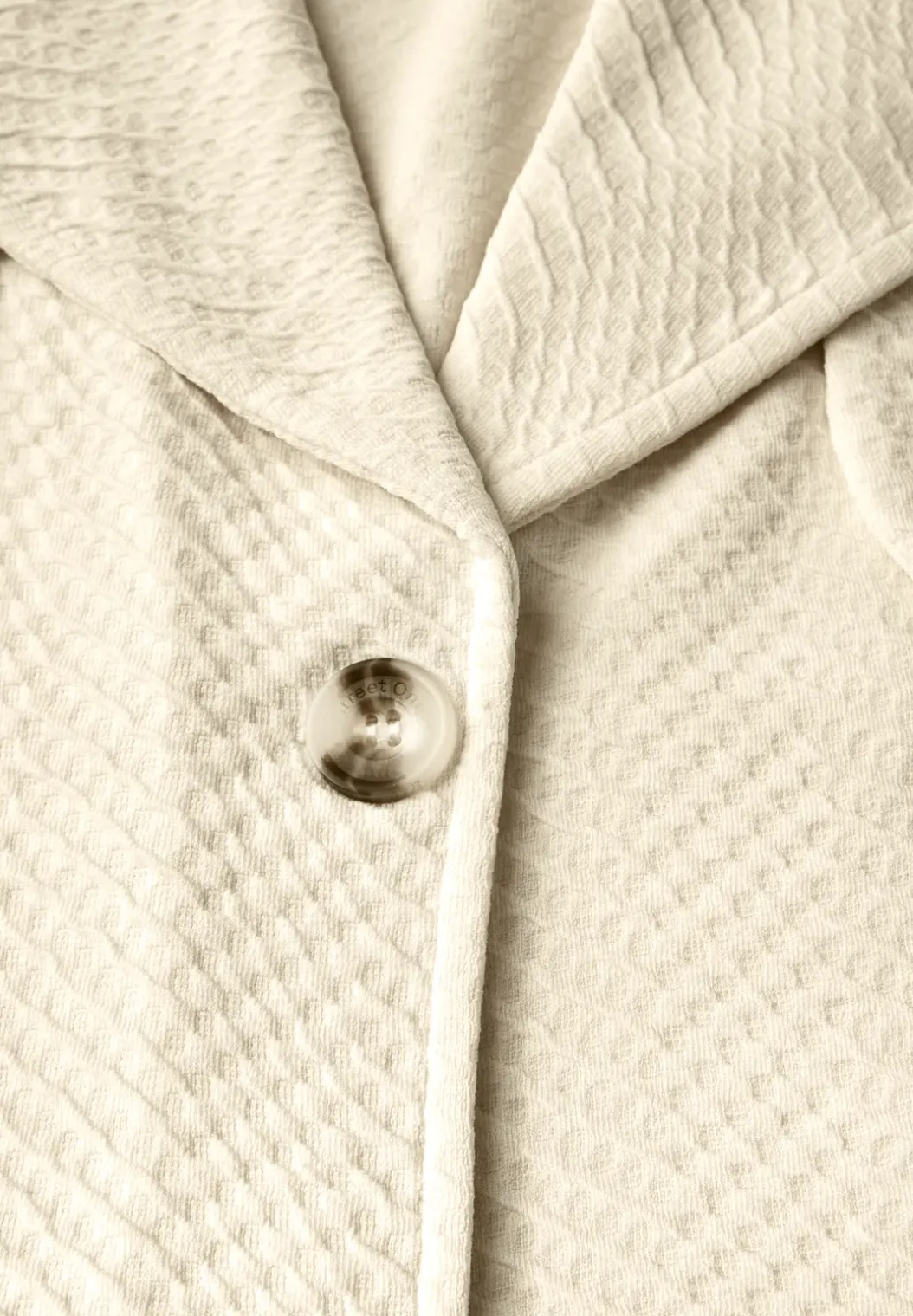 Korte gestructureerde trenchcoat
