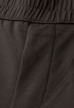 Mid Waist Slim Legs broek in Loose Fit